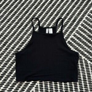 Divided high neck cropped tank top. Size: Small